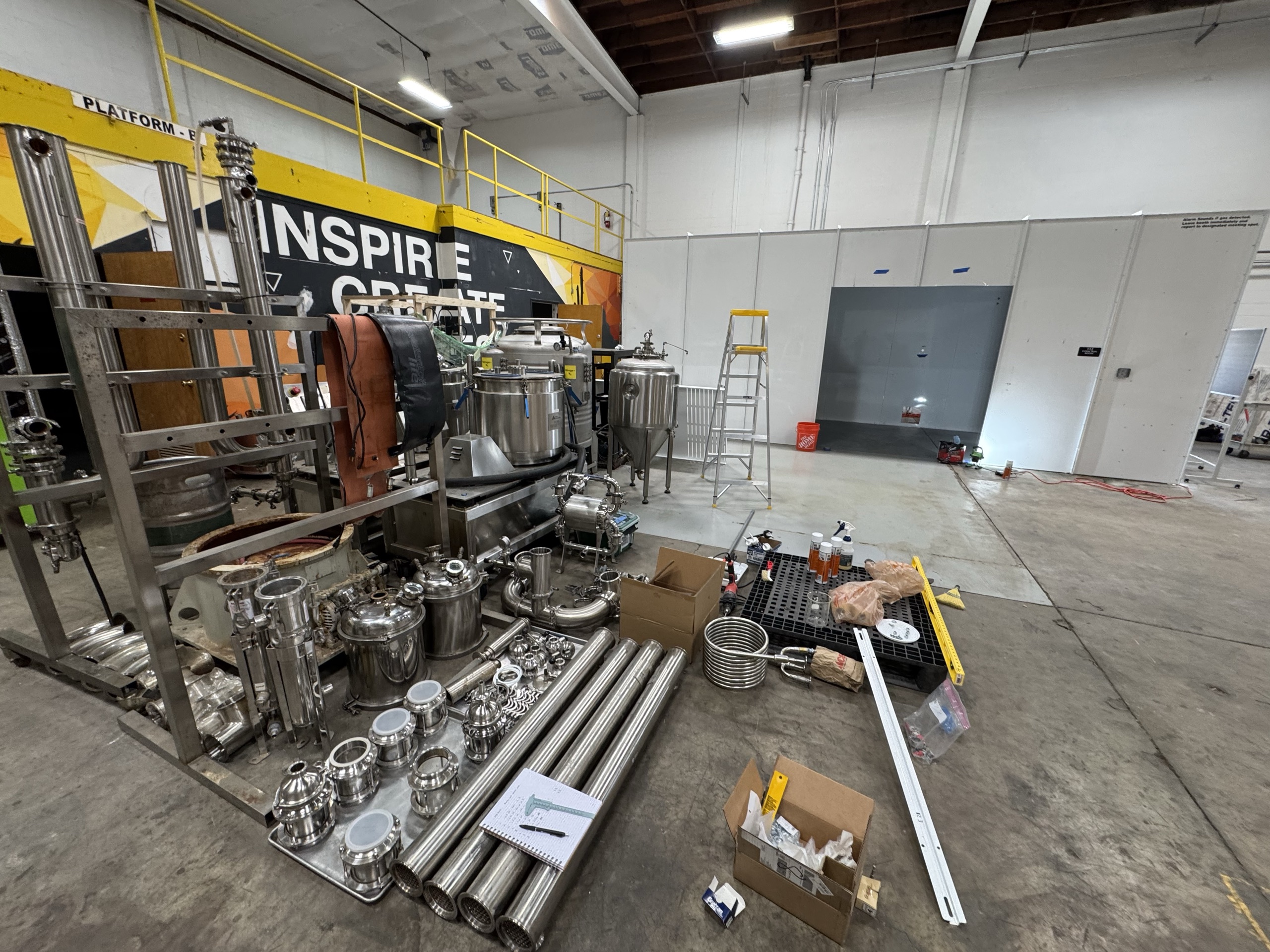 Production floor — extraction skid & mezzanine